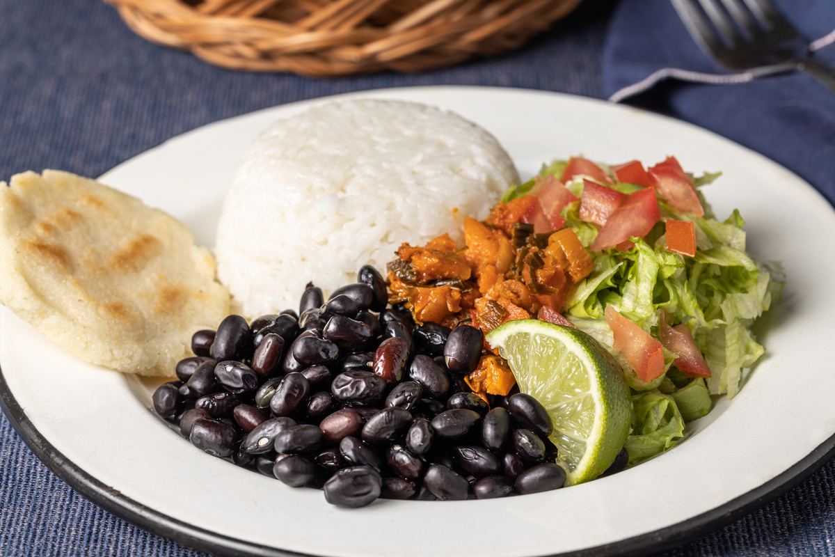 Close up of Casado, typical Costa Rican dish with rice, beans and vegetables.